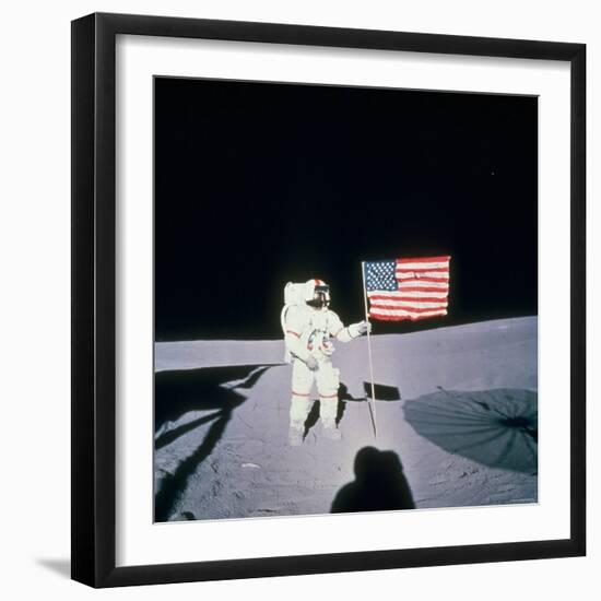 Astronaut Alan Shepard Planting American Flag on the Moon's Surface During Apollo 14 Mission-null-Framed Photographic Print