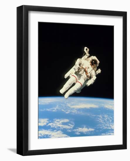 Astronaut Bruce McCandless Walking In Space-null-Framed Photographic Print