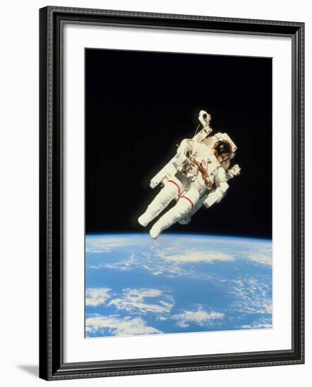 Astronaut Bruce McCandless Walking In Space-null-Framed Photographic Print