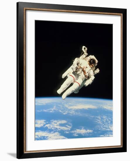 Astronaut Bruce McCandless Walking In Space-null-Framed Photographic Print