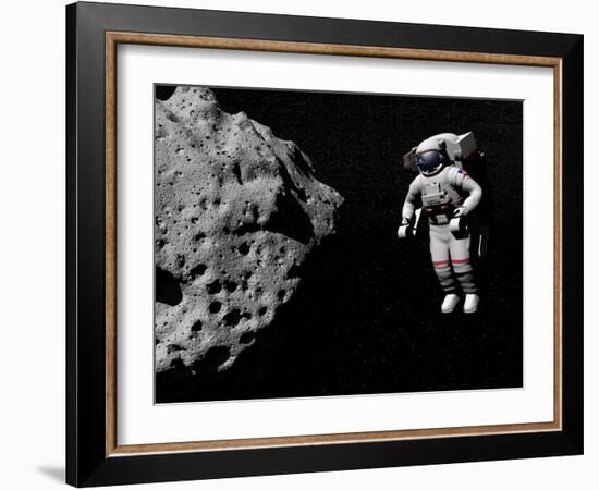 Astronaut Exploring an Asteroid in Outer Space-null-Framed Art Print