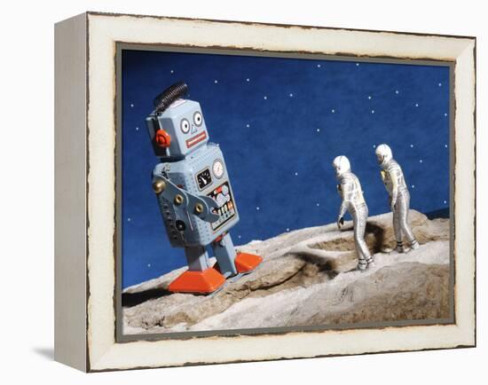 Astronaut Figurines Standing Beside Gray Toy Rocket-null-Framed Premier Image Canvas