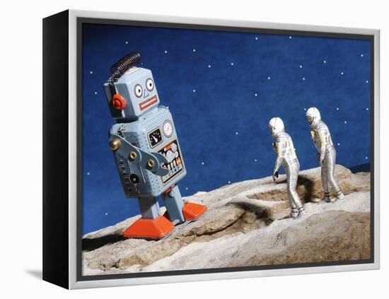 Astronaut Figurines Standing Beside Gray Toy Rocket-null-Framed Premier Image Canvas