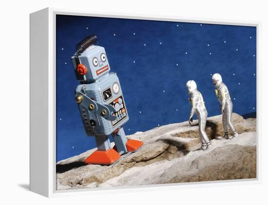 Astronaut Figurines Standing Beside Gray Toy Rocket-null-Framed Premier Image Canvas