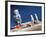 Astronaut Figurines Standing Beside Gray Toy Rocket-null-Framed Photographic Print