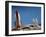 Astronaut Figurines Standing Beside Toy Rocket-null-Framed Photographic Print