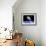 Astronaut Floating in Outer Space Above Planet Earth-null-Framed Art Print displayed on a wall