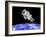 Astronaut Floating in Outer Space Above Planet Earth-null-Framed Art Print