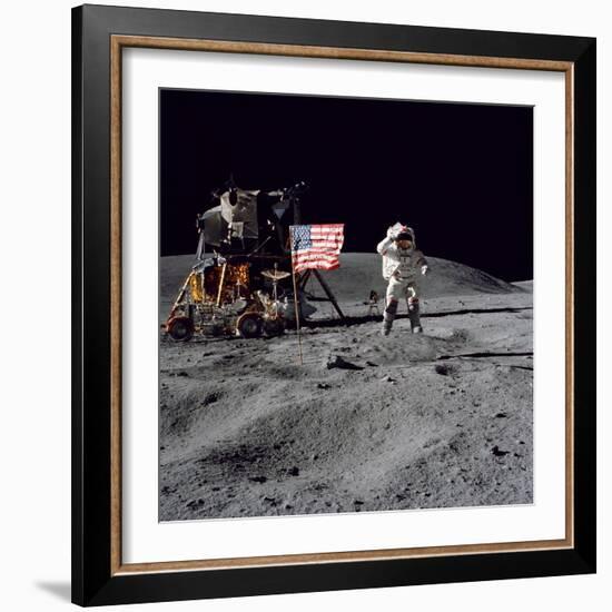 Astronaut John W. Young Salutes the United States Flag During Apollo 16 Mission, 1972-null-Framed Photographic Print