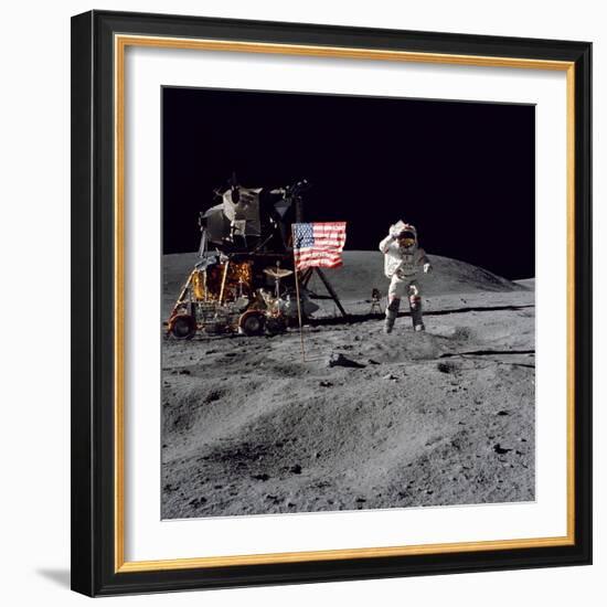 Astronaut John W. Young Salutes the United States Flag During Apollo 16 Mission, 1972-null-Framed Photographic Print