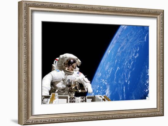 Astronaut Performing a Spacewalk-null-Framed Photographic Print