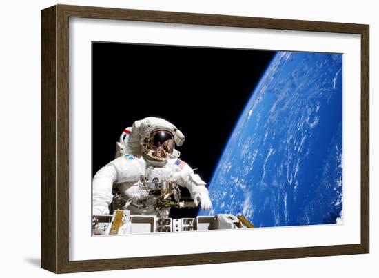 Astronaut Performing a Spacewalk-null-Framed Photographic Print