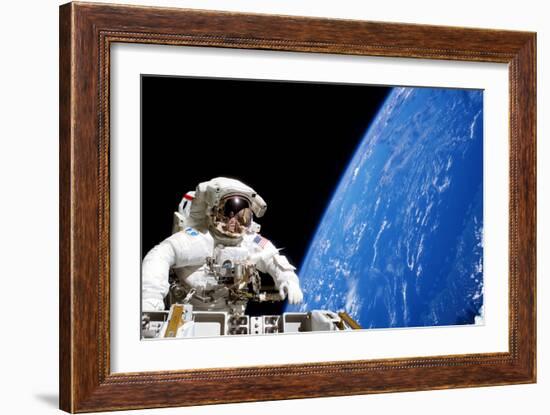 Astronaut Performing a Spacewalk-null-Framed Photographic Print