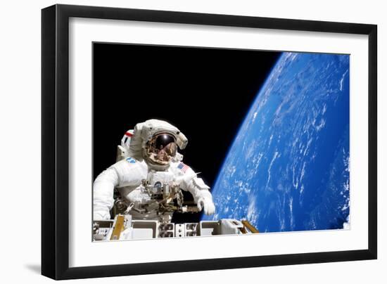 Astronaut Performing a Spacewalk-null-Framed Photographic Print