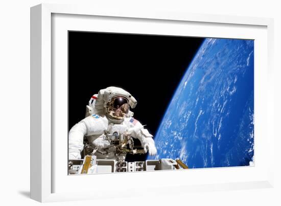 Astronaut Performing a Spacewalk-null-Framed Photographic Print