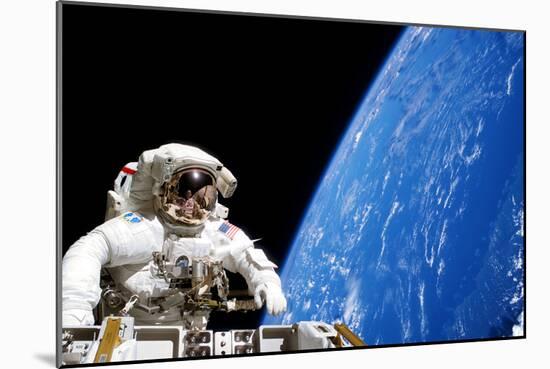 Astronaut Performing a Spacewalk-null-Mounted Photographic Print