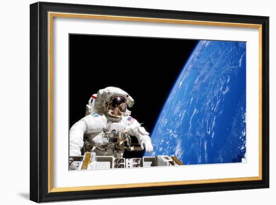 Astronaut Performing a Spacewalk-null-Framed Photographic Print