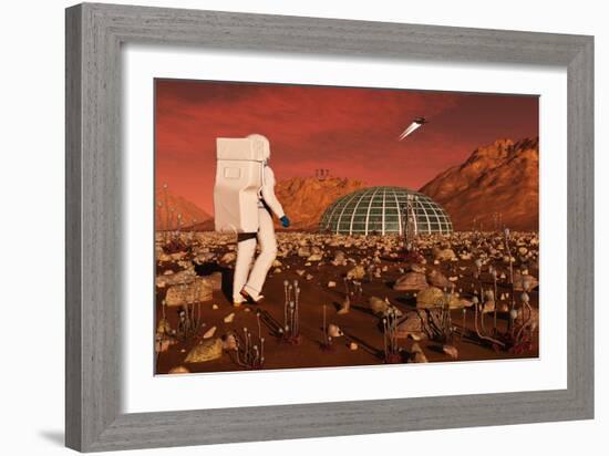 Astronaut Walking across the Surface of Mars Towards a Habitat Dome-Stocktrek Images-Framed Art Print