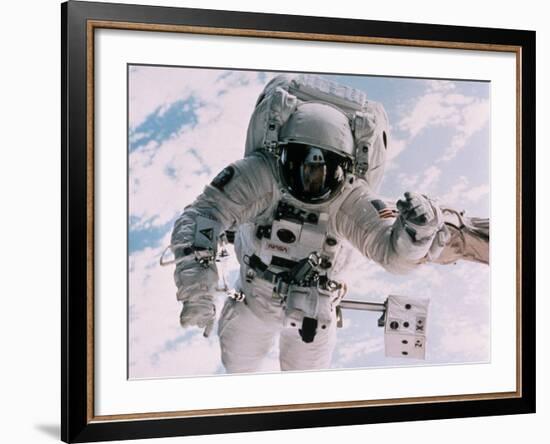 Astronaut Walking in Space-David Bases-Framed Photographic Print