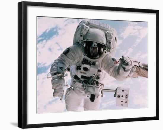 Astronaut Walking in Space-David Bases-Framed Photographic Print