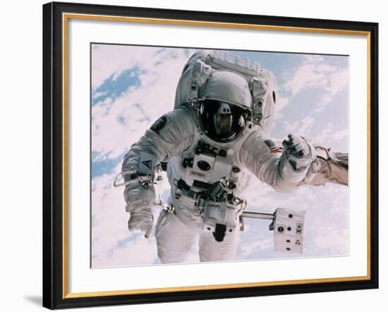 Astronaut Walking in Space-David Bases-Framed Photographic Print