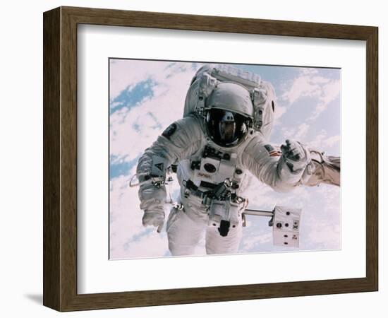 Astronaut Walking in Space-David Bases-Framed Photographic Print