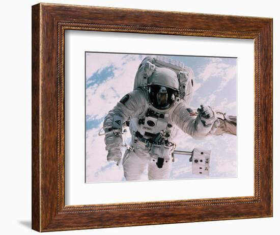 Astronaut Walking in Space-David Bases-Framed Photographic Print
