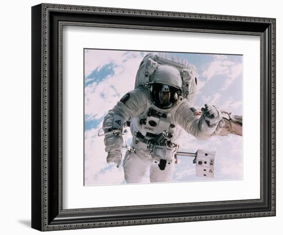 Astronaut Walking in Space-David Bases-Framed Photographic Print