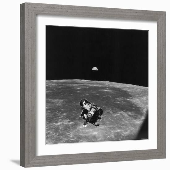 Astronauts in Apollo 11 Spacecraft, on Return Trip to Earth After Collecting Souvenirs-null-Framed Photographic Print