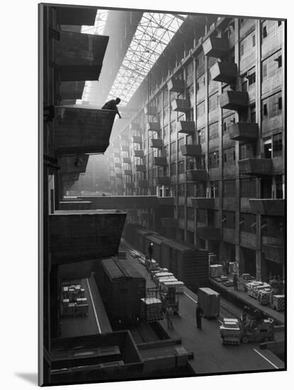 At Brooklyn Army Base Freight Is Lifted from Car to Jutting Loading Platforms-Andreas Feininger-Mounted Photographic Print