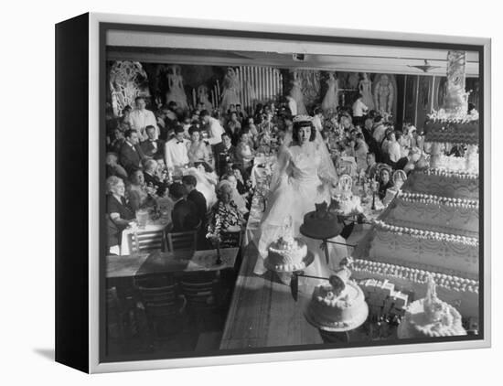 At Palumbo's Cafe, Bride Mrs. Salvatore Cannella Walks Onto Stage, Facing a Revolving Cake Display-Cornell Capa-Framed Premier Image Canvas