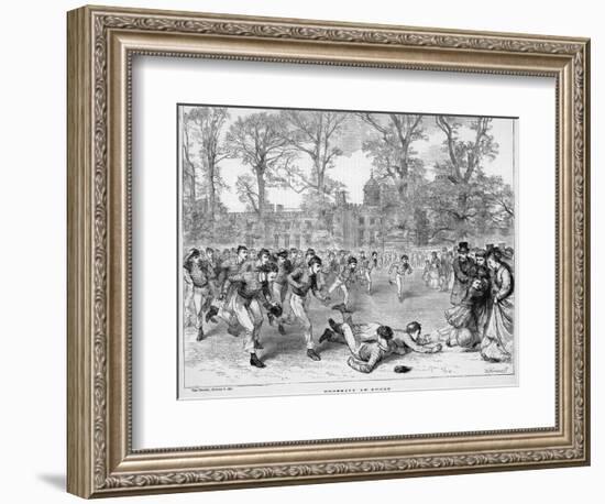 At Rugby School a Crowd of Schoolboys Run after the Ball at Rugby-Walter Thomas-Framed Photographic Print