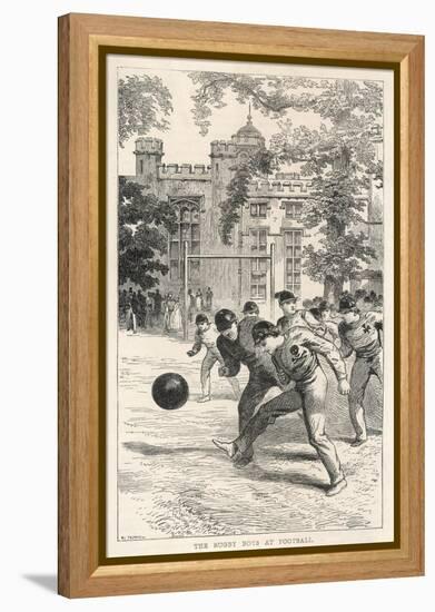 At Rugby School Boys at Rugby School Play Rugby Football in the School Grounds-Walter Thomas-Framed Stretched Canvas