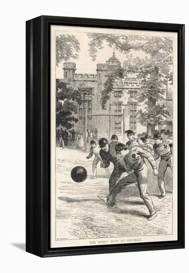 At Rugby School Boys at Rugby School Play Rugby Football in the School Grounds-Walter Thomas-Framed Stretched Canvas