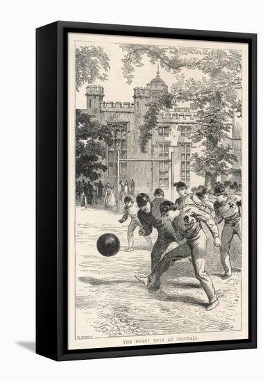 At Rugby School Boys at Rugby School Play Rugby Football in the School Grounds-Walter Thomas-Framed Stretched Canvas