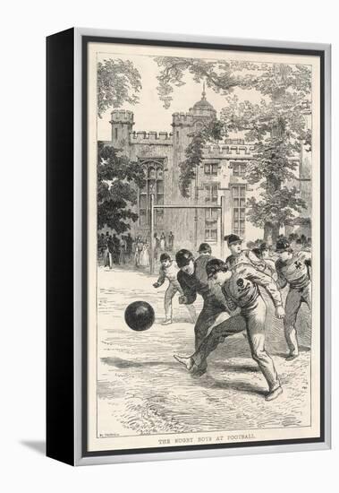 At Rugby School Boys at Rugby School Play Rugby Football in the School Grounds-Walter Thomas-Framed Stretched Canvas