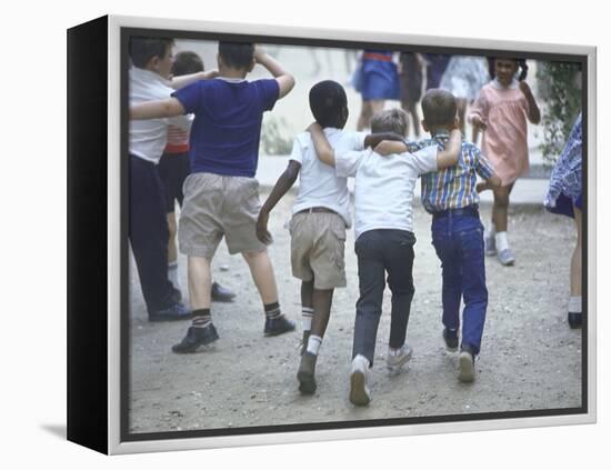 At the Desegregated Lusher School Three Boys Display Camaraderie Walking Through Playground-Bill Eppridge-Framed Premier Image Canvas