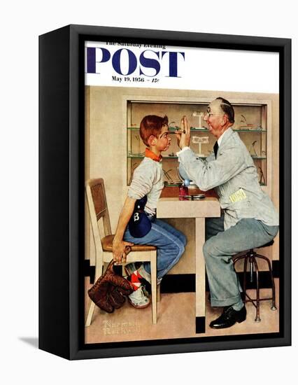 "At the Optometrist" or "Eye Doctor" Saturday Evening Post Cover, May 19,1956-Norman Rockwell-Framed Premier Image Canvas