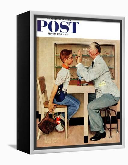 "At the Optometrist" or "Eye Doctor" Saturday Evening Post Cover, May 19,1956-Norman Rockwell-Framed Premier Image Canvas