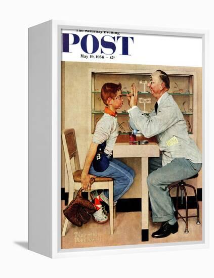 "At the Optometrist" or "Eye Doctor" Saturday Evening Post Cover, May 19,1956-Norman Rockwell-Framed Premier Image Canvas