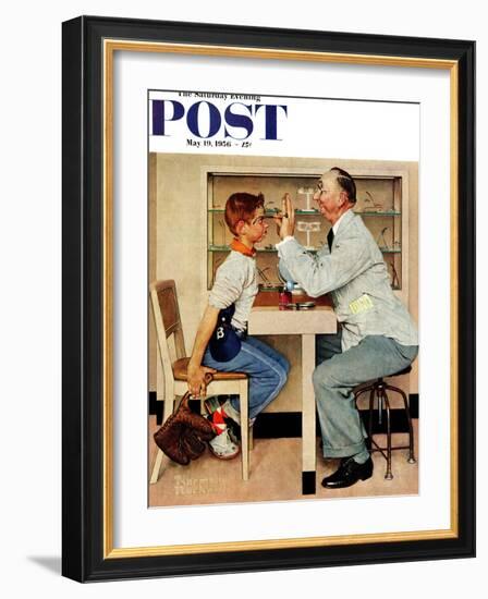 "At the Optometrist" or "Eye Doctor" Saturday Evening Post Cover, May 19,1956-Norman Rockwell-Framed Premium Giclee Print