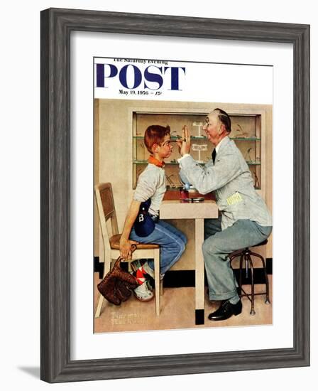 "At the Optometrist" or "Eye Doctor" Saturday Evening Post Cover, May 19,1956-Norman Rockwell-Framed Giclee Print