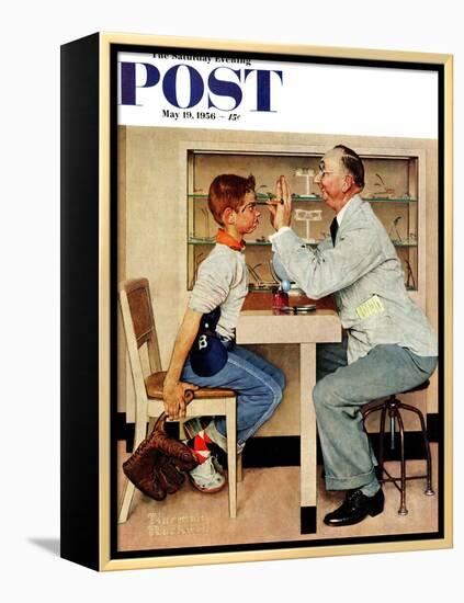 "At the Optometrist" or "Eye Doctor" Saturday Evening Post Cover, May 19,1956-Norman Rockwell-Framed Premier Image Canvas