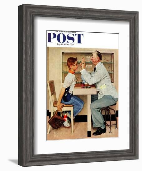 "At the Optometrist" or "Eye Doctor" Saturday Evening Post Cover, May 19,1956-Norman Rockwell-Framed Giclee Print