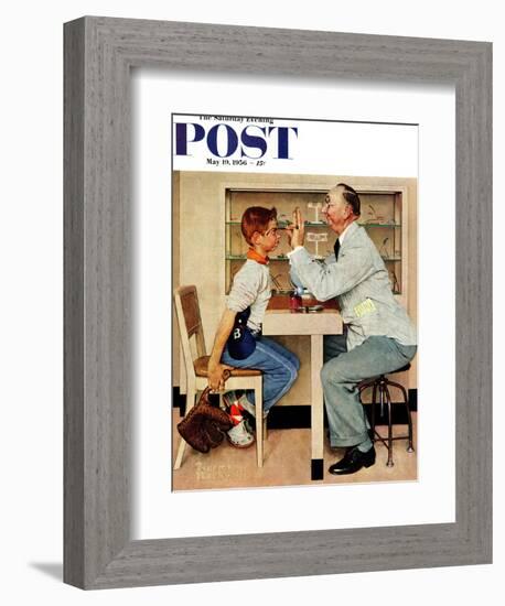 "At the Optometrist" or "Eye Doctor" Saturday Evening Post Cover, May 19,1956-Norman Rockwell-Framed Giclee Print