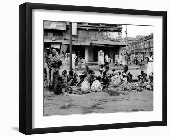 At the Peak of India's Famine in Late Oct 1943, Starving Homeless People Huddle in Calcutta Street-null-Framed Photo