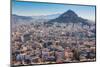 Athens, Attica, Greece. View over Athens from the Acropolis to 277 meter high Mount Lycabettus...-null-Mounted Photographic Print