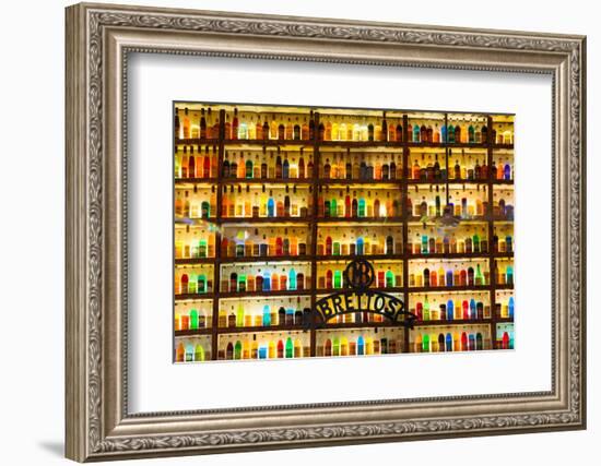 Athens, Attica, Greece. Wall of liquor and liqueur products available in the Brettos shop in the...-null-Framed Photographic Print