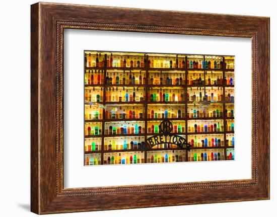 Athens, Attica, Greece. Wall of liquor and liqueur products available in the Brettos shop in the...-null-Framed Photographic Print