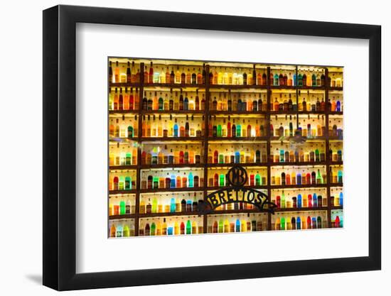 Athens, Attica, Greece. Wall of liquor and liqueur products available in the Brettos shop in the...-null-Framed Photographic Print